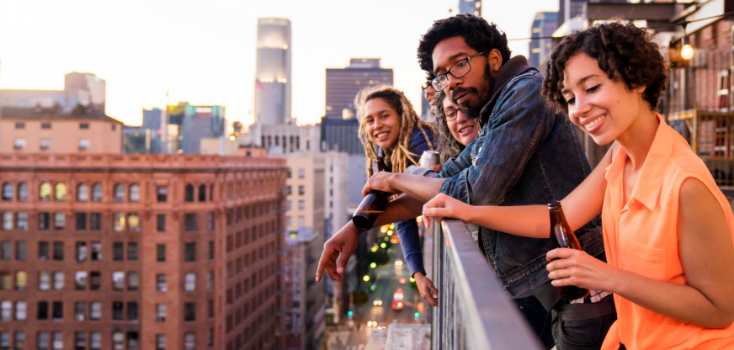 People looking at the view at a rooftop patio